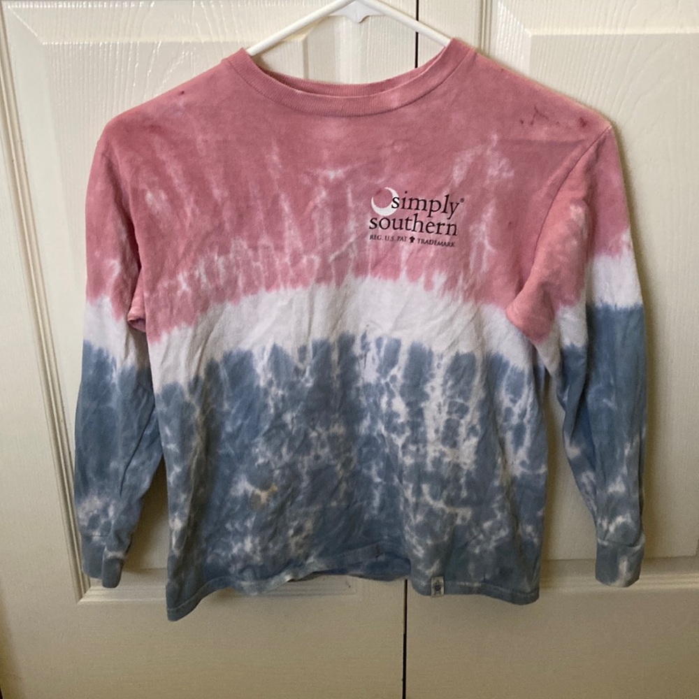 Simply southern it is pink and blue and has a great design on the back